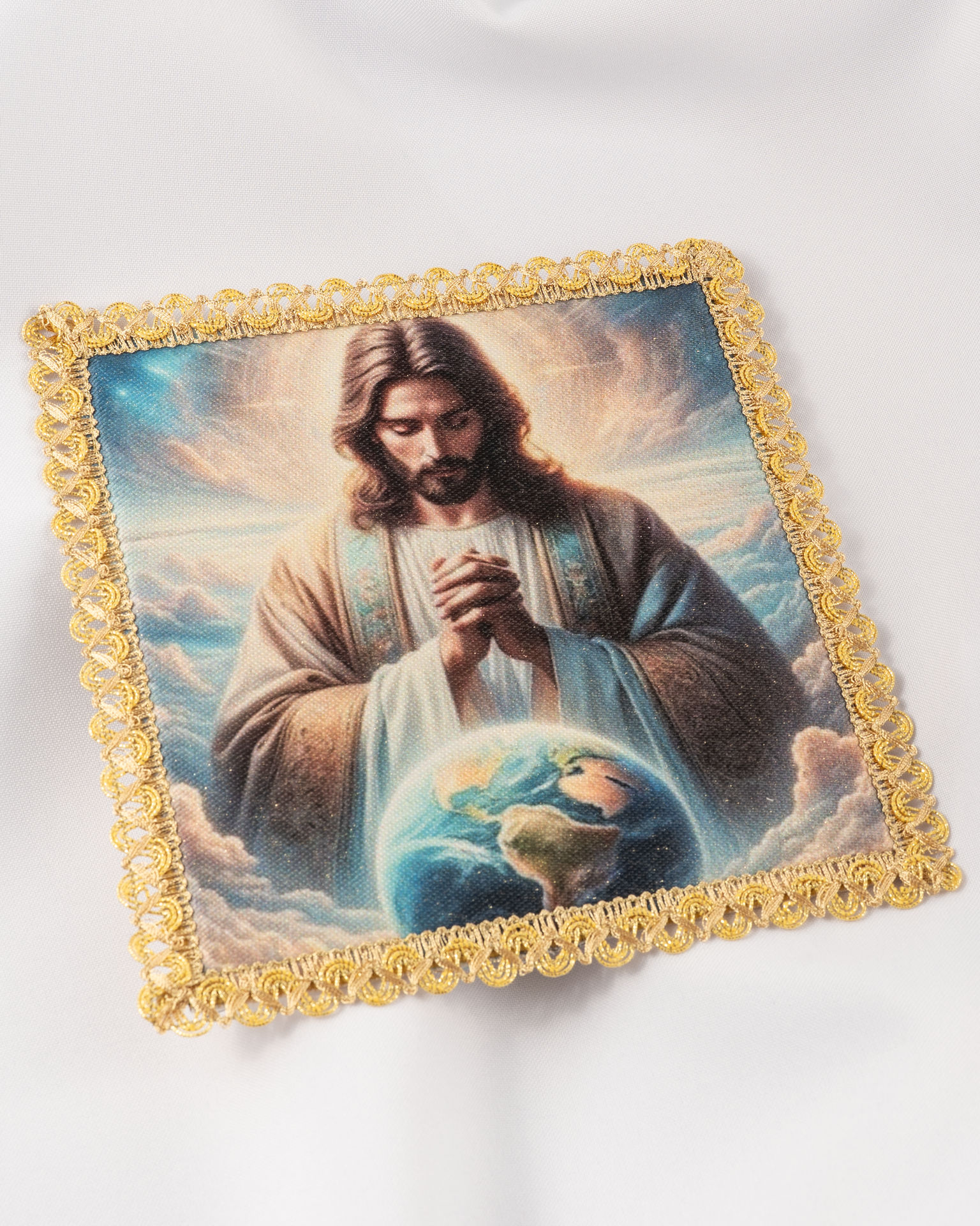Pala com a imagem de Cristo Rei do Universo
