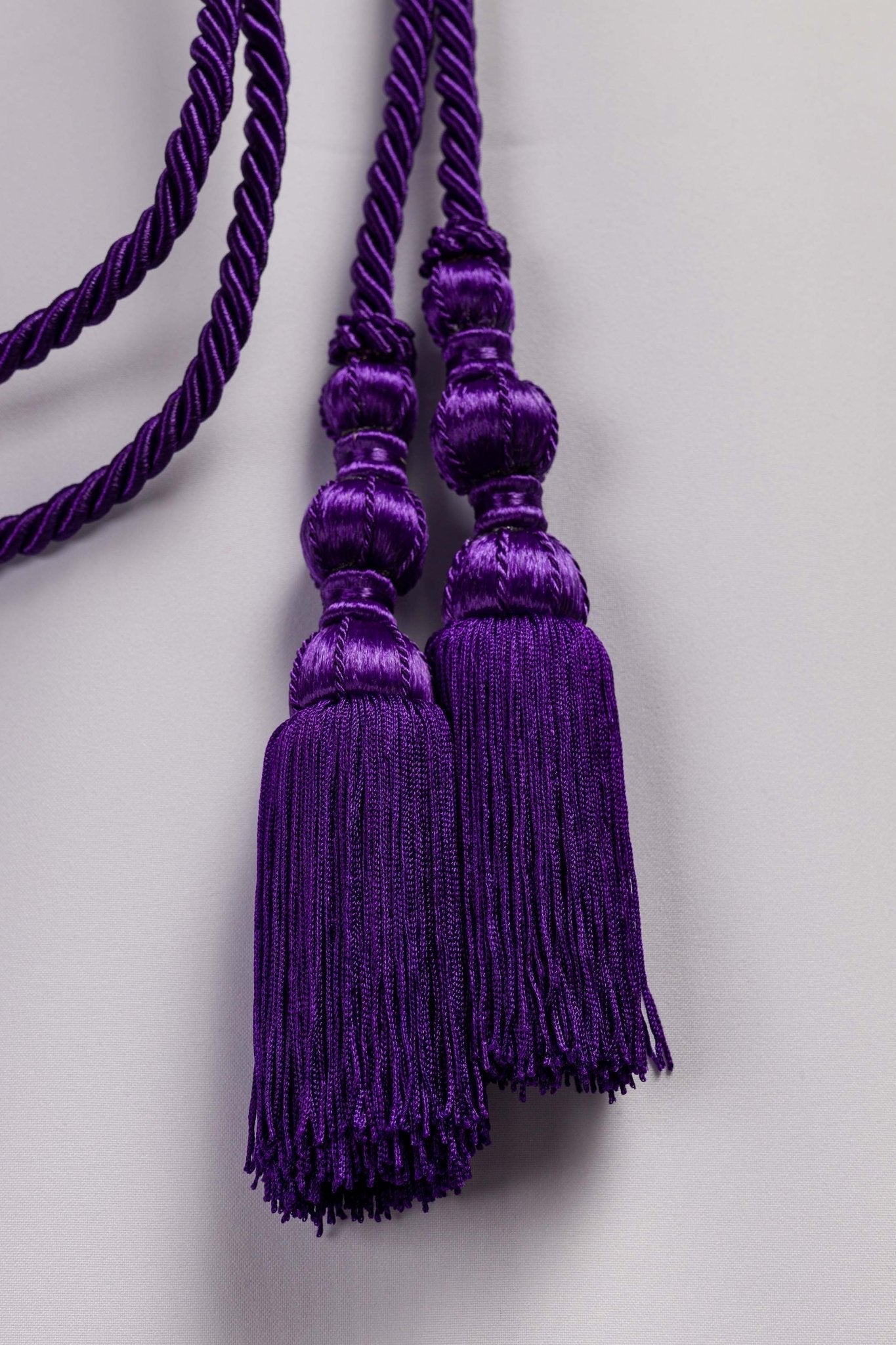 Cíngulo litúrgico roxo