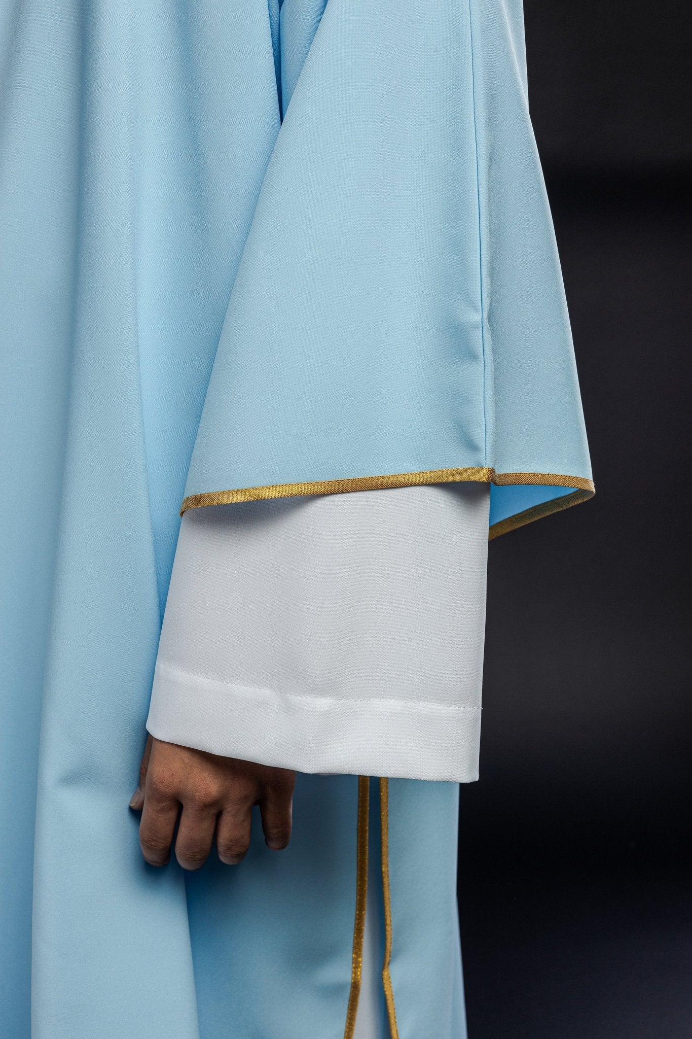 Dalmática azul lisa com debrum dourado